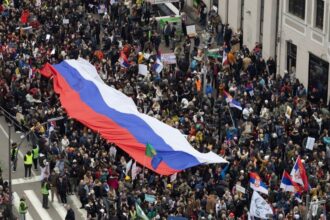 Serbians hold silent protest to honour railway station victims